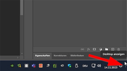 Click the space next to the bell to minimise all windows or press Windows Key + D.