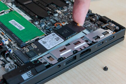 The SSD must be lifted gently and then pulled out.